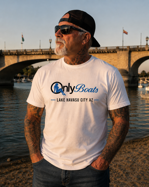 Man wearing a white OnlyBoats t-shirt by the London Bridge in Lake Havasu City