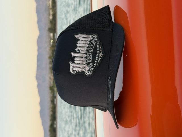 Black Inland Society trucker hat with embroidered patch
