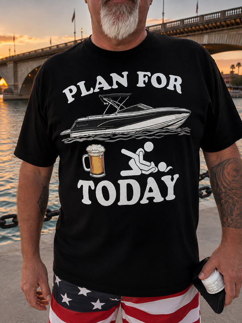 Man wearing black Plan For Today beer and boat print t-shirt at London Bridge