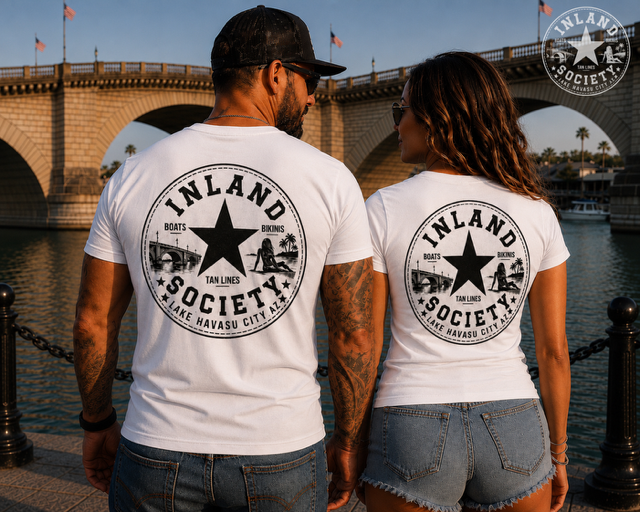 Couple wearing white Inland Society all-star tees at London Bridge
